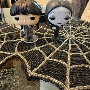 Wednesday and Morticia Funko Pops